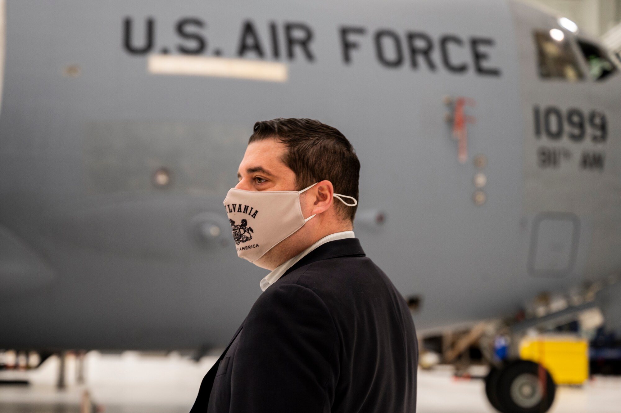 Pennsylvania State Sen. Devlin Robinson looks around inside the new two-bay hangar at the Pittsburgh International Airport Air Reserve Station, Pennsylvania, Feb. 26, 2021.