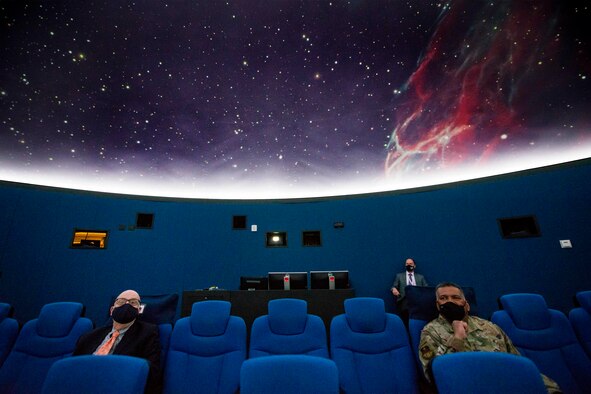 Acting Secretary of the Air Force John P. Roth attends a presentation in the U.S. Air Force Academy's planetarium with Lt. Gen. Richard Clark, the academy's superintendent, March 10, 2021. Roth visited the base to meet staff, faculty and cadets, and emphasize the importance of staying true to the Air Force priorities: supporting and defending the Constitution, serving the American people, and protecting the nation.