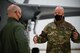 U.S. Air Force Col. David Berkland, the 354th Fighter Wing commander, talks to U.S. Space Force Gen. John W. “Jay” Raymond, Chief of Space Operations, on Eielson Air Force Base, Alaska, March 10, 2021.