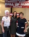 Coach's Denise Gorski (on right) and Joan Ash (on left) attended Maj. Allison Brager's induction into her high school's hall of fame. Gorski helped Brager become the school's first female pole vaulter. Ash coached ladies golf and was Brager's Latin teacher, inspiring Brager to enter college as a Classics major.