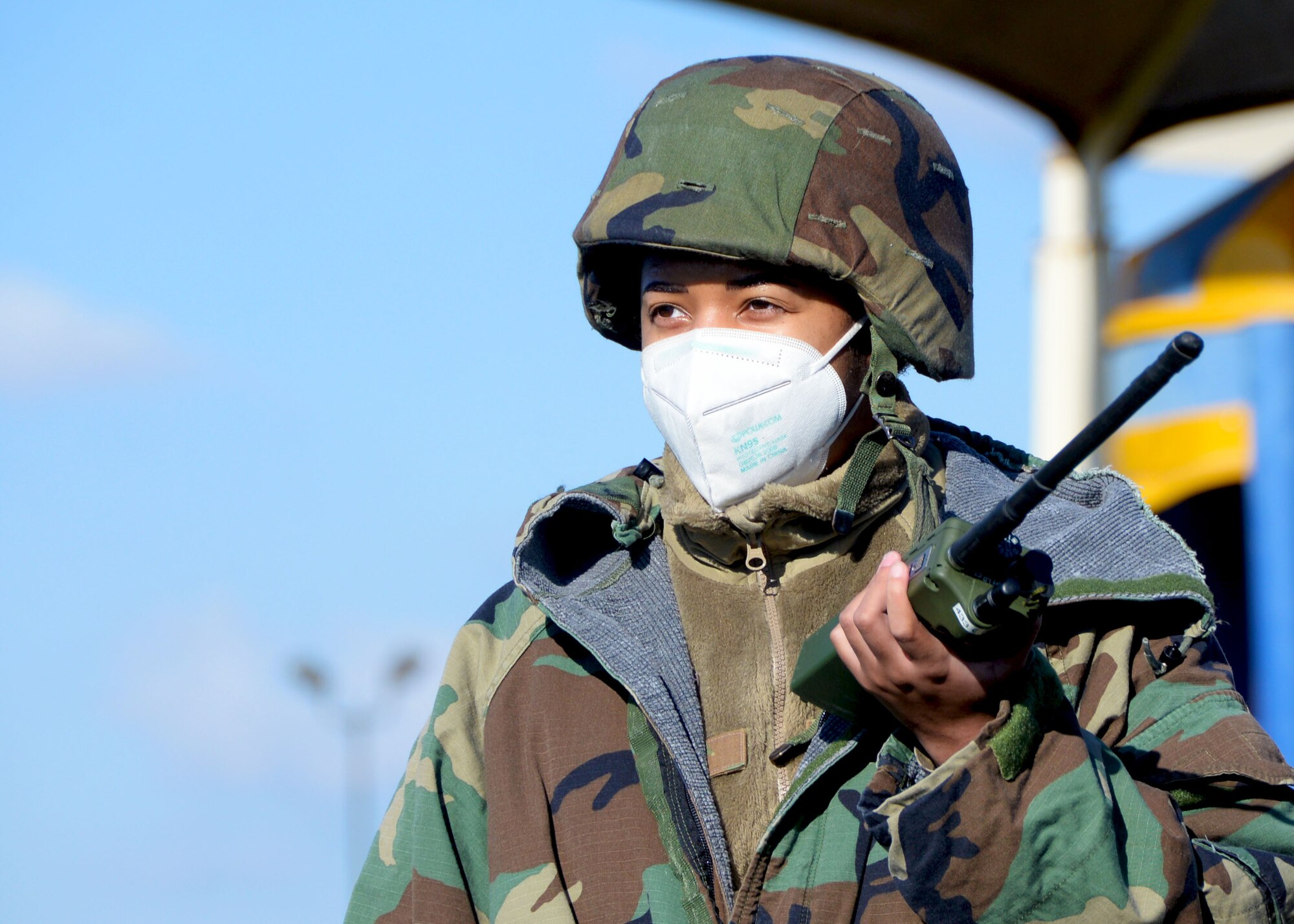 Senior Airman Cheyenne Hill, 68th Airlift Squadron resource management specialist, speaks into a radio during a simulated post attack reconnaissance sweep March 6, 2021, at Joint Base San Antonio-Lackland, Texas. Airmen from five different units in the 433rd Airlift Wing participated in the wing-wide exercise to prepare for readiness. (U.S. Air Force photo by Tech. Sgt. Samantha Mathison)