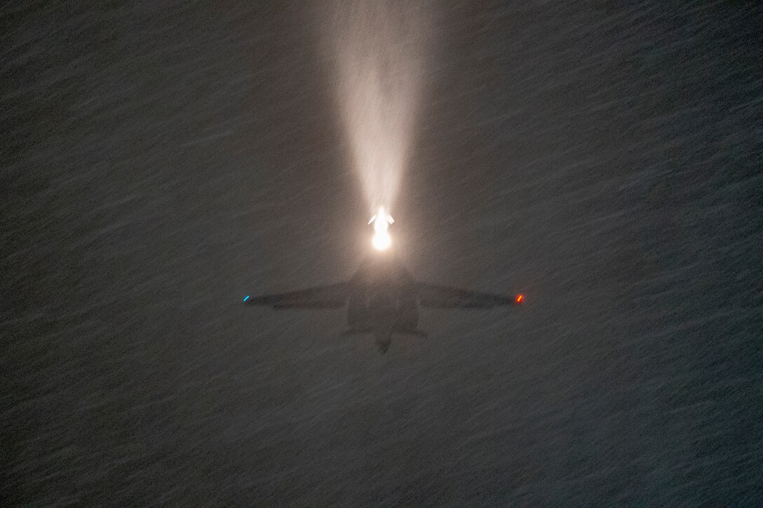 A B-1B Lancer assigned to the 9th Expeditionary Bomb Squadron flies over Ørland Air Force Station, Norway, March 8, 2021. The B-1 was refueled using warm-pit ground refueling at Bodø AFS, Norway, as part of a Bomber Task Force Europe training mission, Agile Condor. (U.S. Air Force photo by 2nd Lt. Daniel Barnhorst)