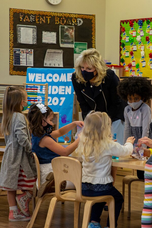 First Lady of the United States Dr. Jill Biden interacts with children at Stepping Stones Child Development Center, Marine Corps Air Ground Combat Center, Twentynine Palms, California, March 10, 2021. Biden visited the Combat Center to speak with military spouses about the unique challenges and support needed by U.S. service members and families; and to re-engage the Joining Forces Program, an initiative that began in 2011 with Biden and the former First Lady of the United States Michelle Obama.