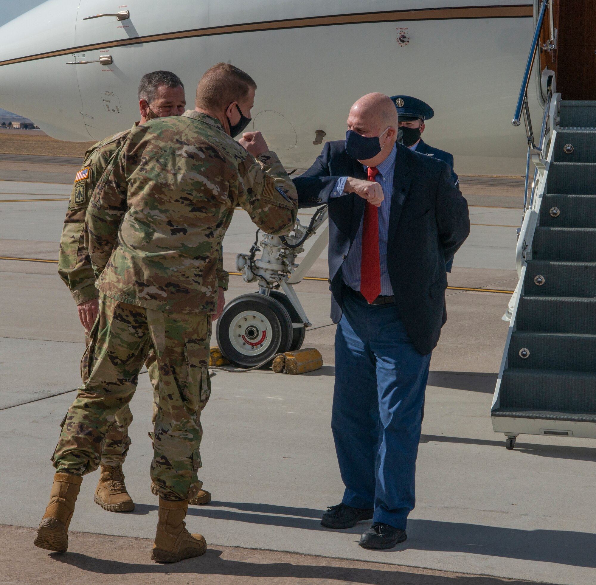 Peterson Schriever Garrison commander greeting the Acting Secretary of the Air Force