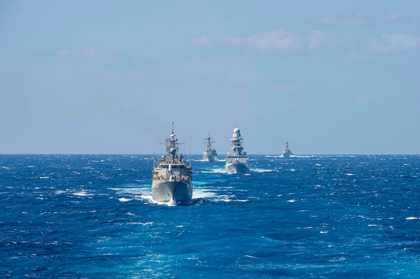 210311-N-OB471-2121 MEDITERRANEAN SEA (March 11, 2021) The Hellenic Hydra-class frigate Psara (F 454), left, the Arleigh-Burke class guided-missile destroyer USS Thomas Hudner (DDG 116), center left, the Italian Carlo Bergamini-class frigate ITS Virginio Fasan (F 591), center right, and the Arleigh-Burke class guided-missile destroyer USS Mitscher (DDG 57) sail in formation with the Nimitz-class aircraft carrier USS Dwight D. Eisenhower (CVN 69), in the Mediterranean Sea, March 11, 2021. The IKE Carrier Strike Group is on a scheduled deployment in the U.S. Sixth Fleet area of operations in support of U.S. national interests and security in Europe and Africa. (U.S. Navy photo by Mass Communication Specialist Seaman Jacob Hilgendorf/Released)