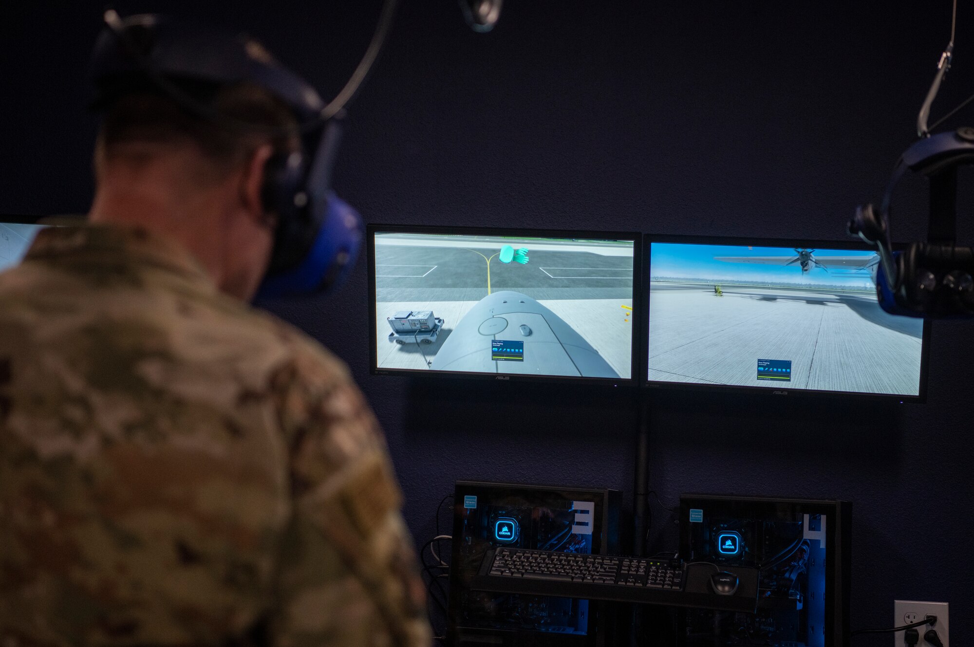 Chief Master Sgt. Chad Bickley, 18th Air Force command chief, stands on a virtual C-130J Super Hercules wing inside a virtual reality headset at Dyess Air Force Base, Texas, Mar. 3, 2021.