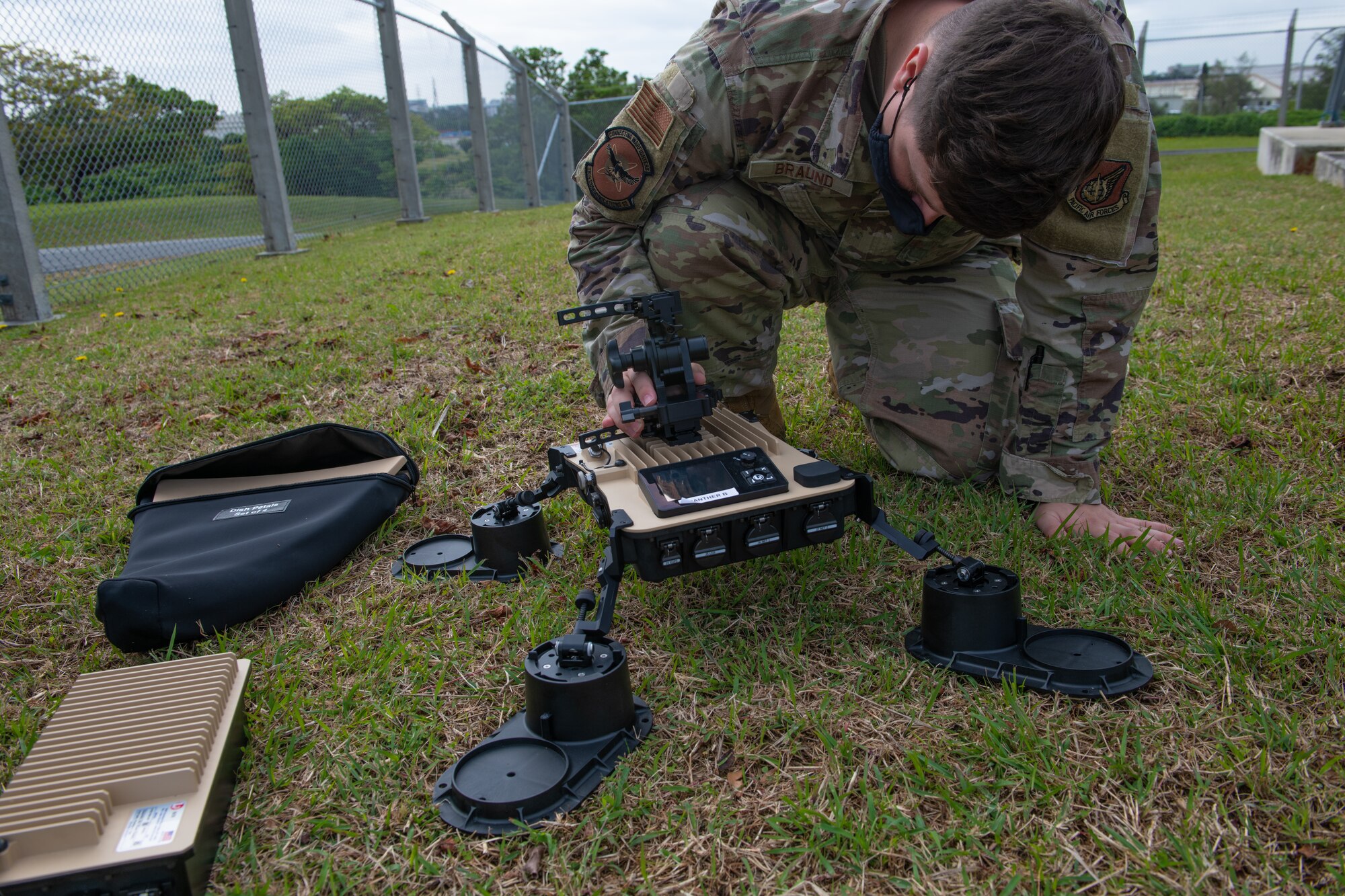 18th CS assembles a VSAT satellite.