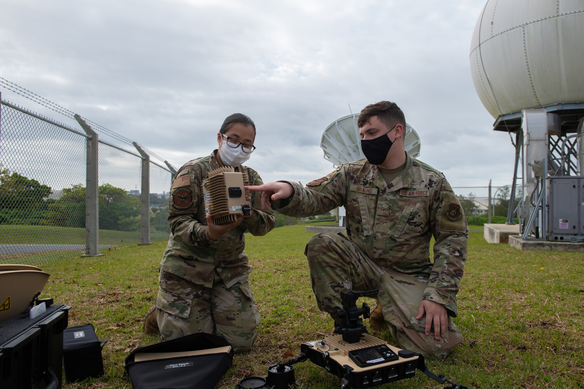 18th CS assembles a VSAT satellite.