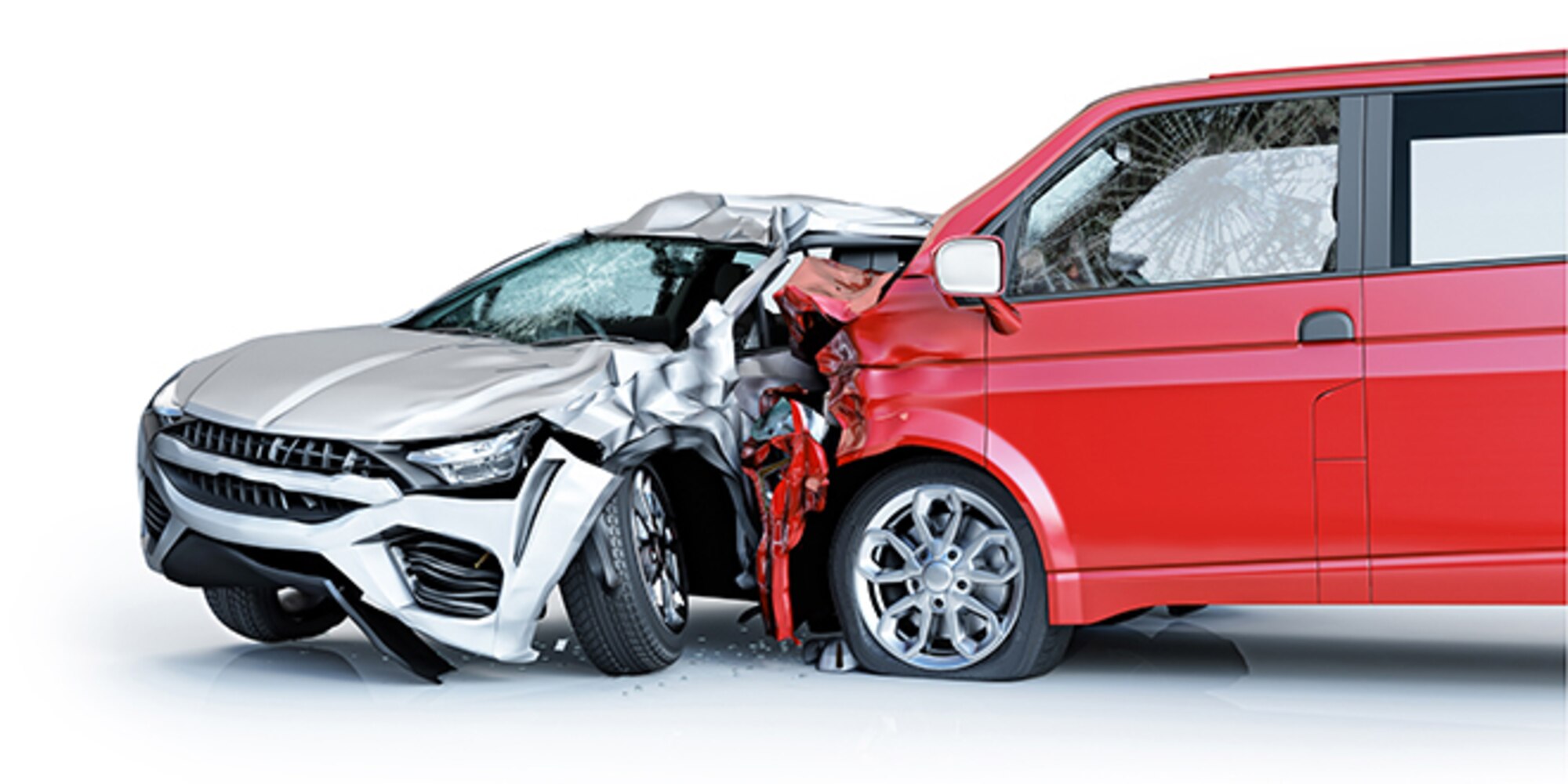 Two-car accident. A red van against a silver sedan. Major damage. Concept totaled vehicles.