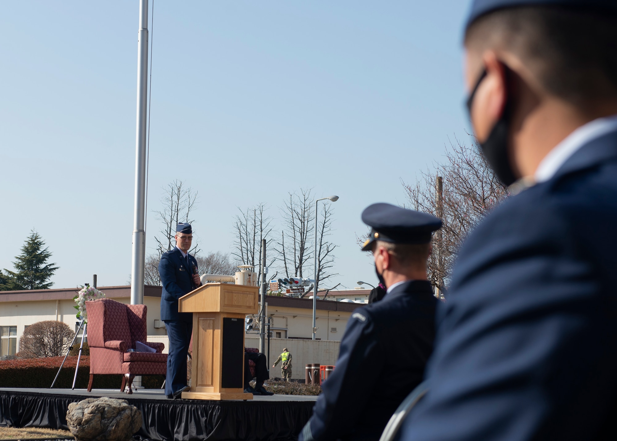 Col. Andrew Campbell, 374th Airlift Wing commander, speaks at a ceremony for the 10th Anniversary of the Great East Japan Earthquake and the Operation Tomodachi support efforts at Yokota Air Base, Japan, March 11, 2021. Campbell spoke about the importance for a continued partnership and strong friendship with the community. (U.S. Air Force photo by Staff Sgt. Joshua Edwards)