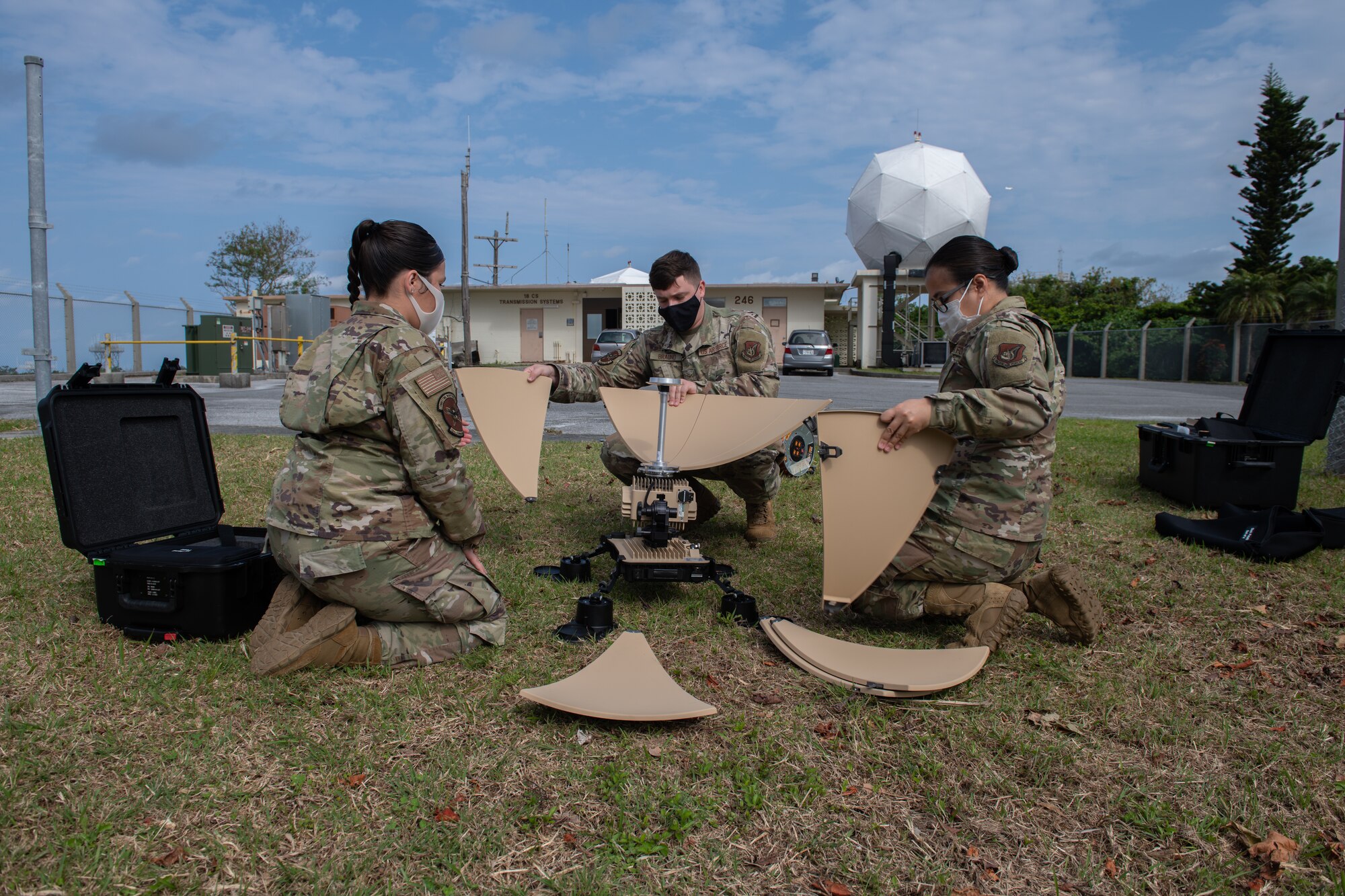 18th CS assembles a VSAT satellite.
