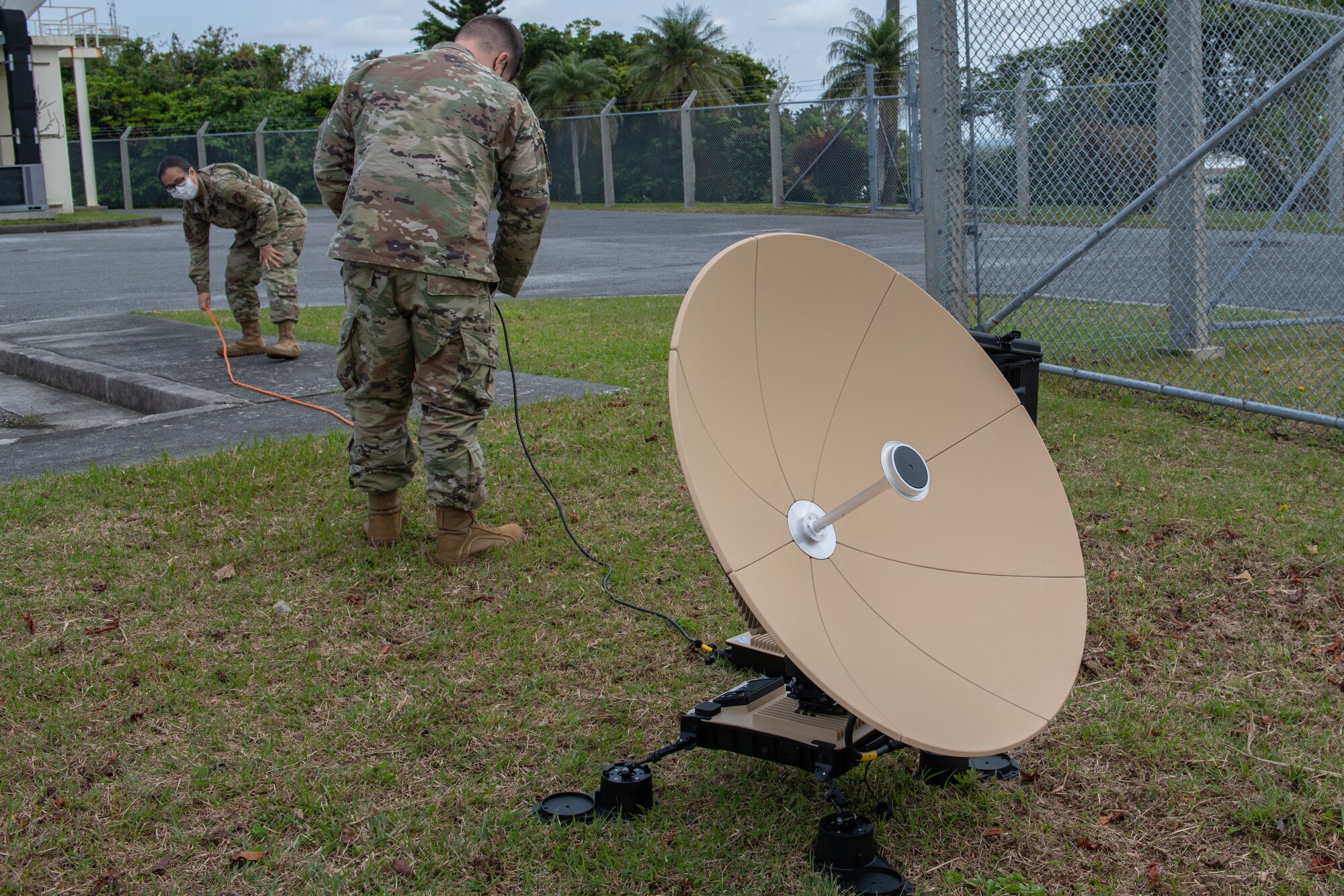 18th CS assembles a VSAT satellite.