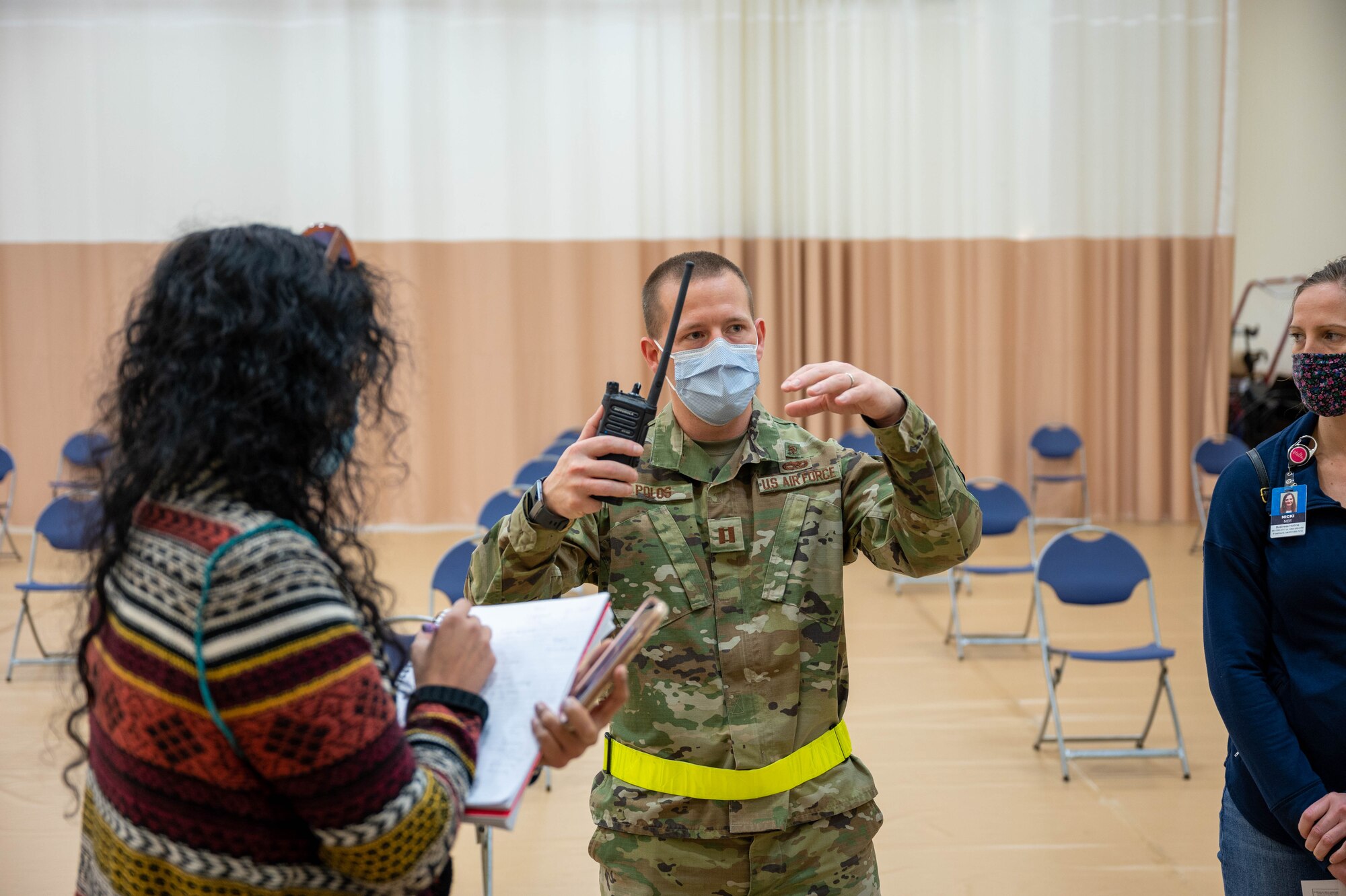 An Airman from the 934th Airlift Wing waits in the observation area after receiving the COVID-19 vaccine at the Minneapolis-St. Paul Air Reserve Station, March 7, 2021. The observation area keeps Airmen for 15 minutes after they receive their shot to ensure no immediate symptoms arise that could require care. (U.S. Air Force photo by Tech. Sgt. Trevor Saylor)