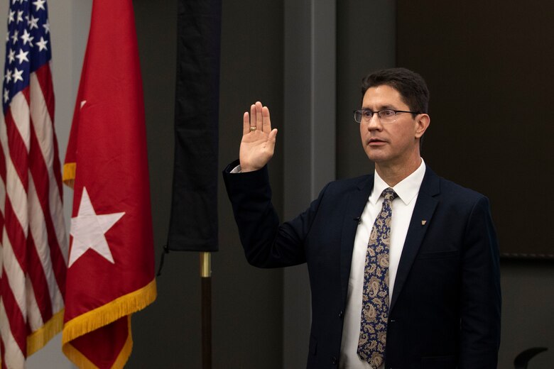 Dr. Edmond Russo, director of the U.S. Army Engineer Research and Development Center’s (ERDC) Environmental Laboratory (EL), takes the oath as he is inducted into the Senior Executive Service (SES) during a hybrid virtual and in-person SES induction ceremony held at the ERDC-EL building in Vicksburg, Miss., March 11, 2021.