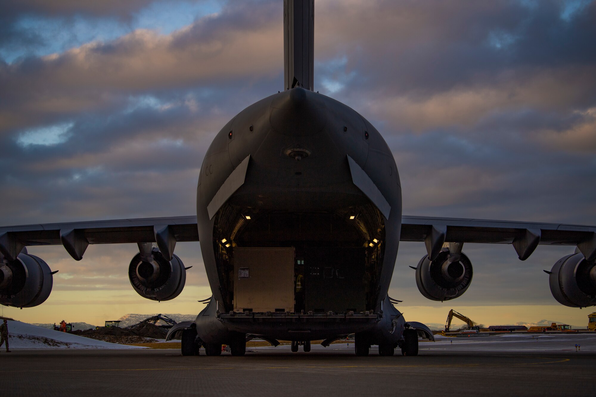 A C-17 Globemaster III, assigned to the 437th Airlift Wing, sits on the flightline at Ørland Air Force Station, Norway, Feb. 23, 2021. The C-17 delivered cargo and equipment needed to ensure success during Bomber Task Force Europe missions. (U.S. Air Force photo by Airman 1st Class Colin Hollowell)