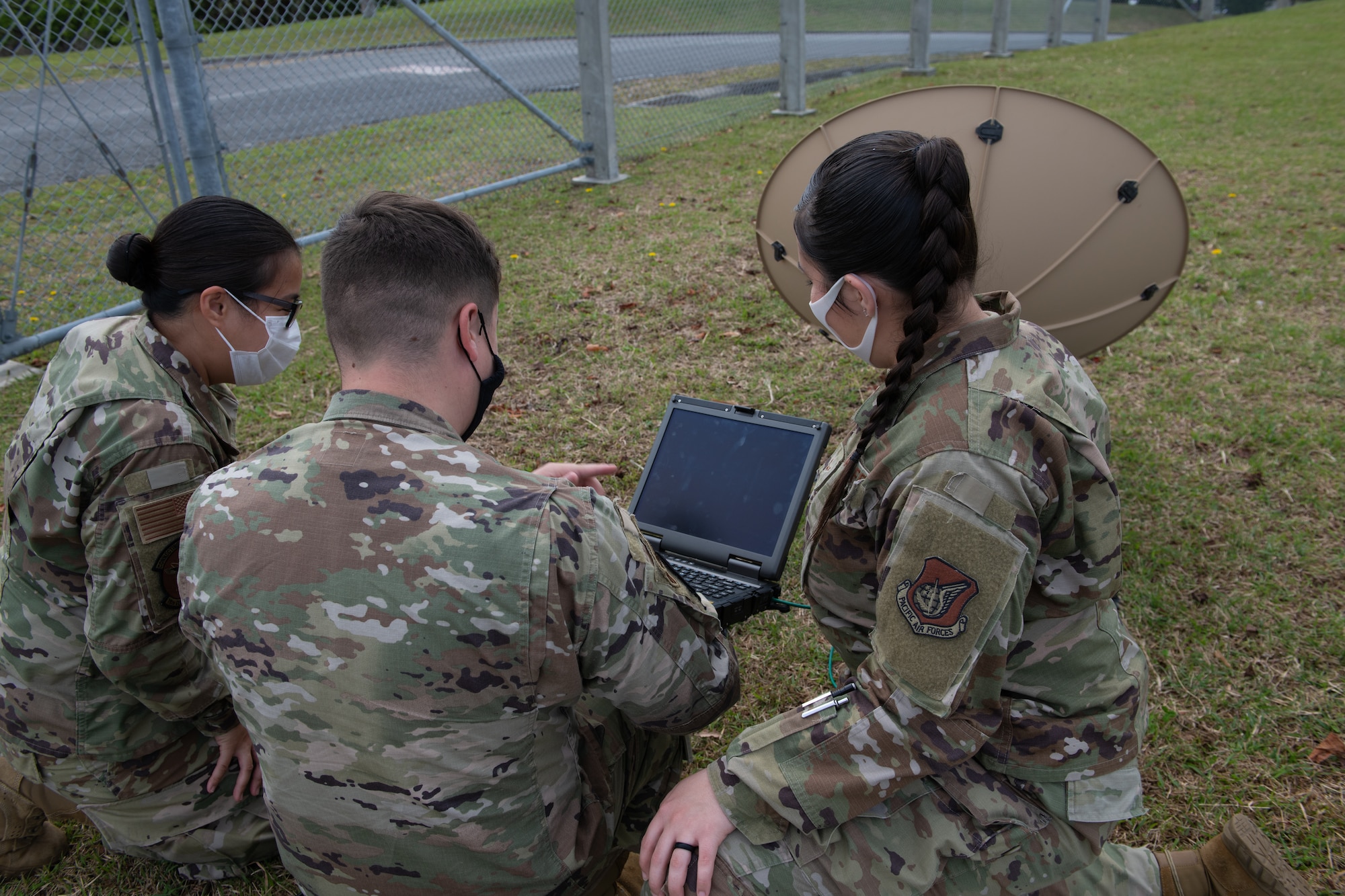 18th CS assembles a VSAT satellite.