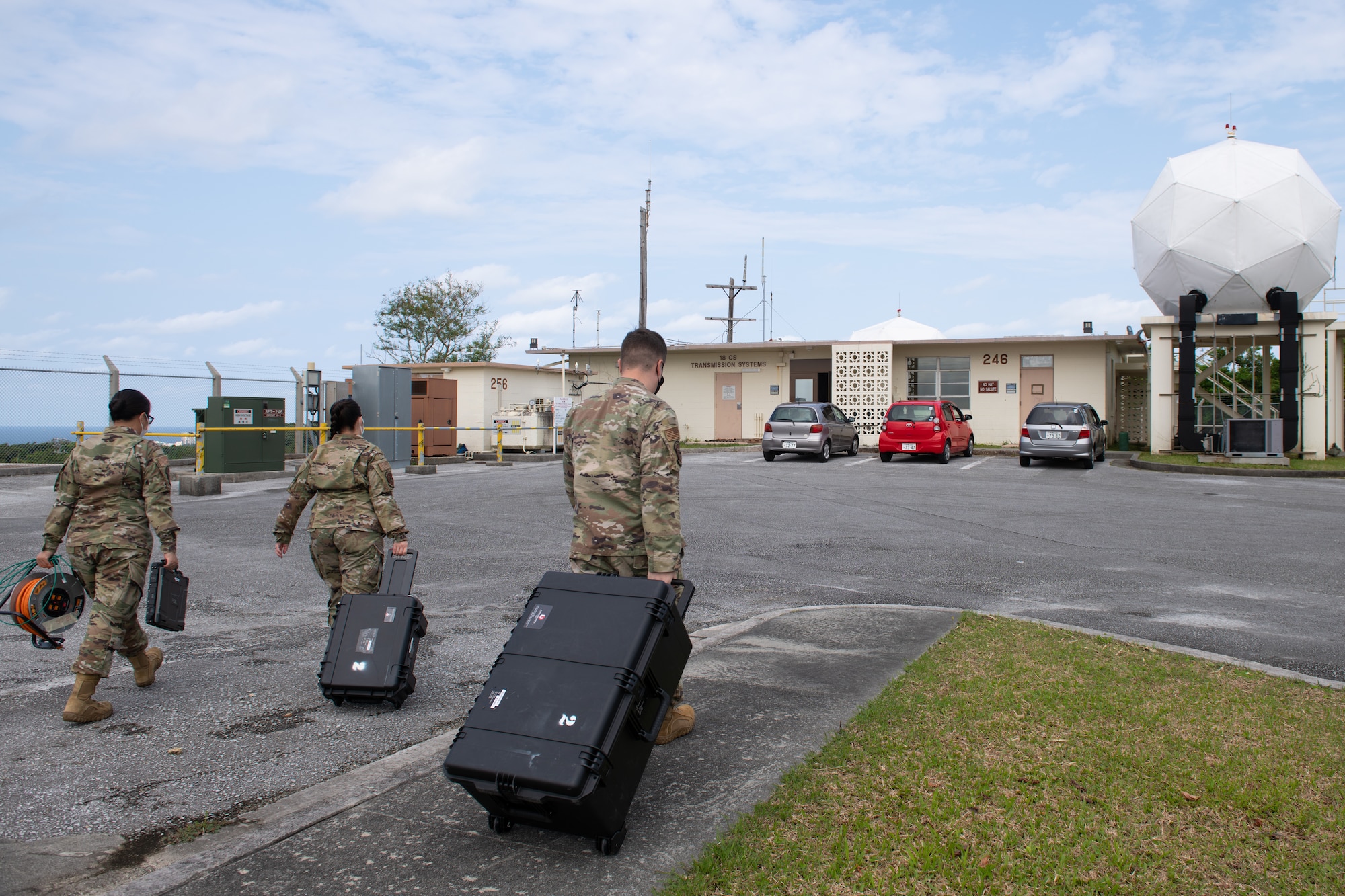 18th CS assemble a VSAT satellite.