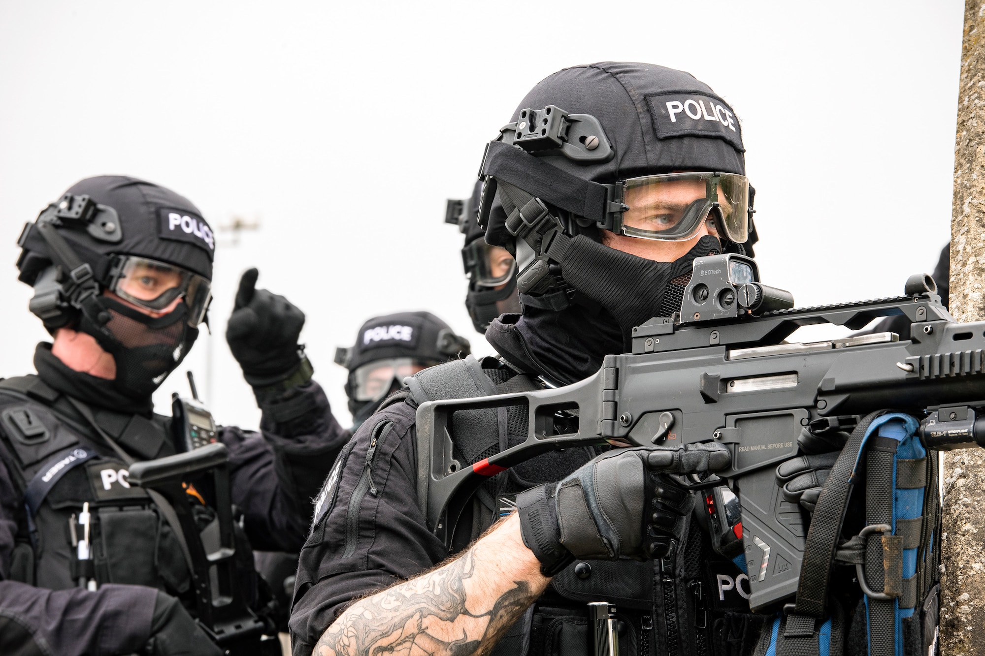 Policemen from the Northamptonshire Police Department, conduct a field training exercise at RAF Croughton, England, Mar. 3, 2021. The NHPD utilized the 422d Security Forces Squadron training complex to help strengthen their tactics and techniques. Events like this help strengthen the local partnership between the 422d SFS and the NHPD. (U.S. Air Force photo by Senior Airman Eugene Oliver)