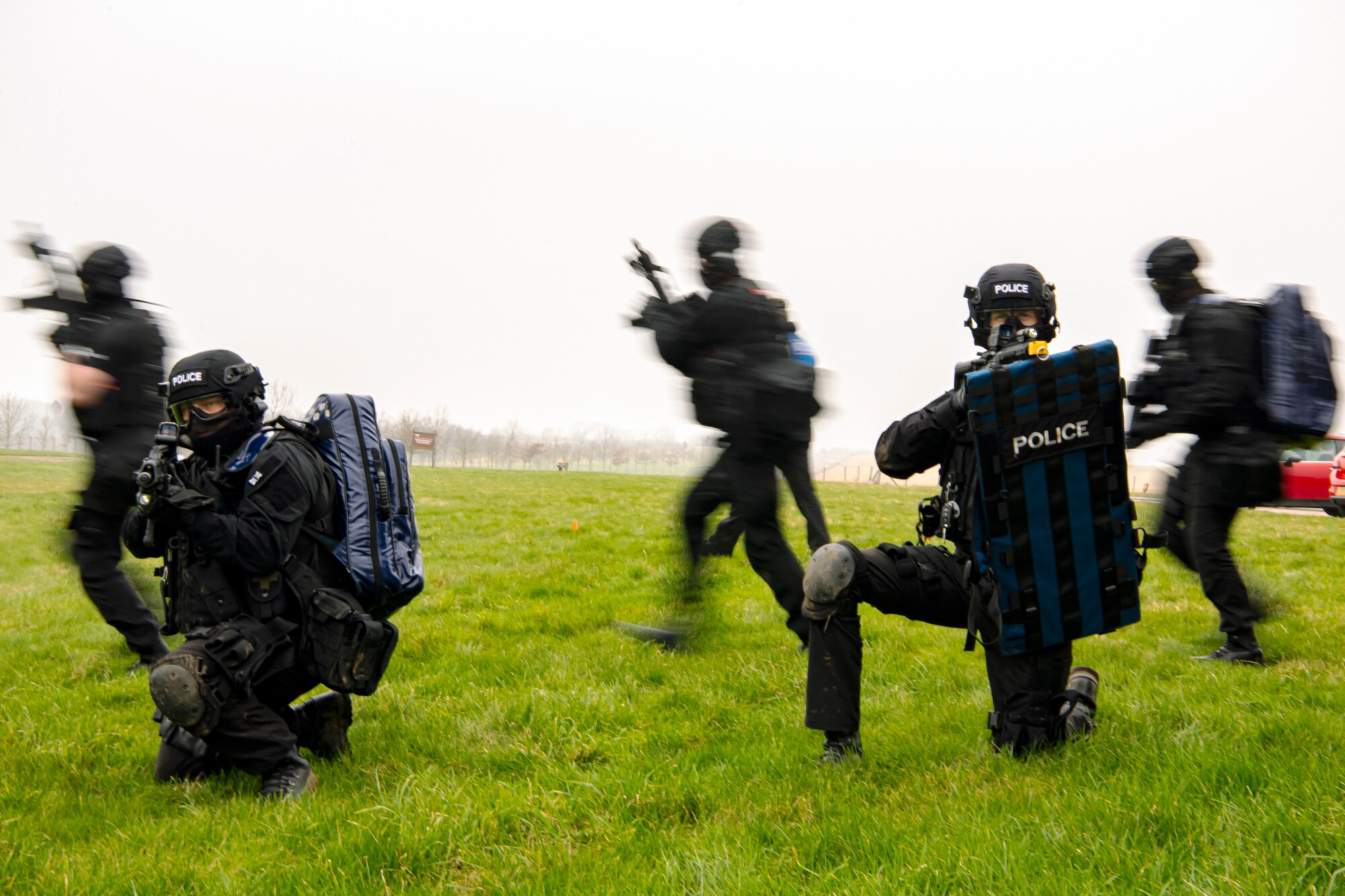 Policemen from the Northamptonshire Police Department, conduct a field training exercise at RAF Croughton, England, Mar. 3, 2021. The NHPD utilized the 422d Security Forces Squadron training complex to help strengthen their tactics and techniques. Events like this help strengthen the local partnership between the 422d SFS and the NHPD. (U.S. Air Force photo by Senior Airman Eugene Oliver)