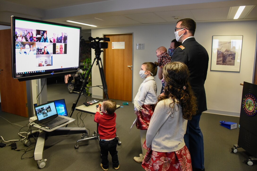 U.S. Army Corps of Engineers, Europe District Deputy Commander Lt. Col. Daniel J. Fox and his family chat with friends and family that joined them virtually for his promotion ceremony in Wiesbaden, Germany Feb. 26, 2021. (U.S. Army photo by Alfredo Barraza)