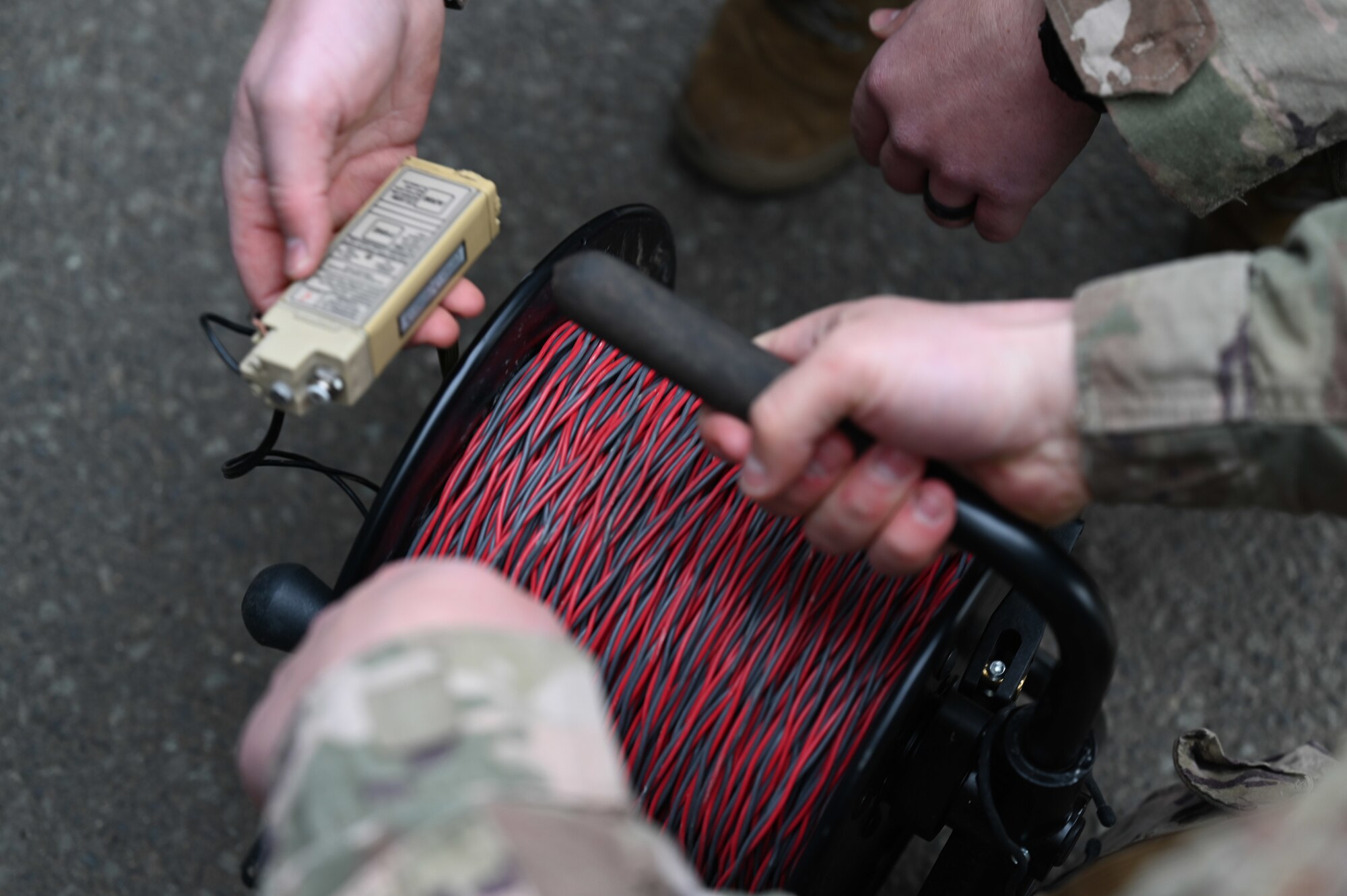 U.S Air Force Airmen assigned to the 786th Civil Engineer Squadron’s Explosive Ordnance Disposal Flight prepare to detonate a ordnance to demonstrate render-safe procedures frequently used on WWII unexploded ordinances during a EOD demonstration