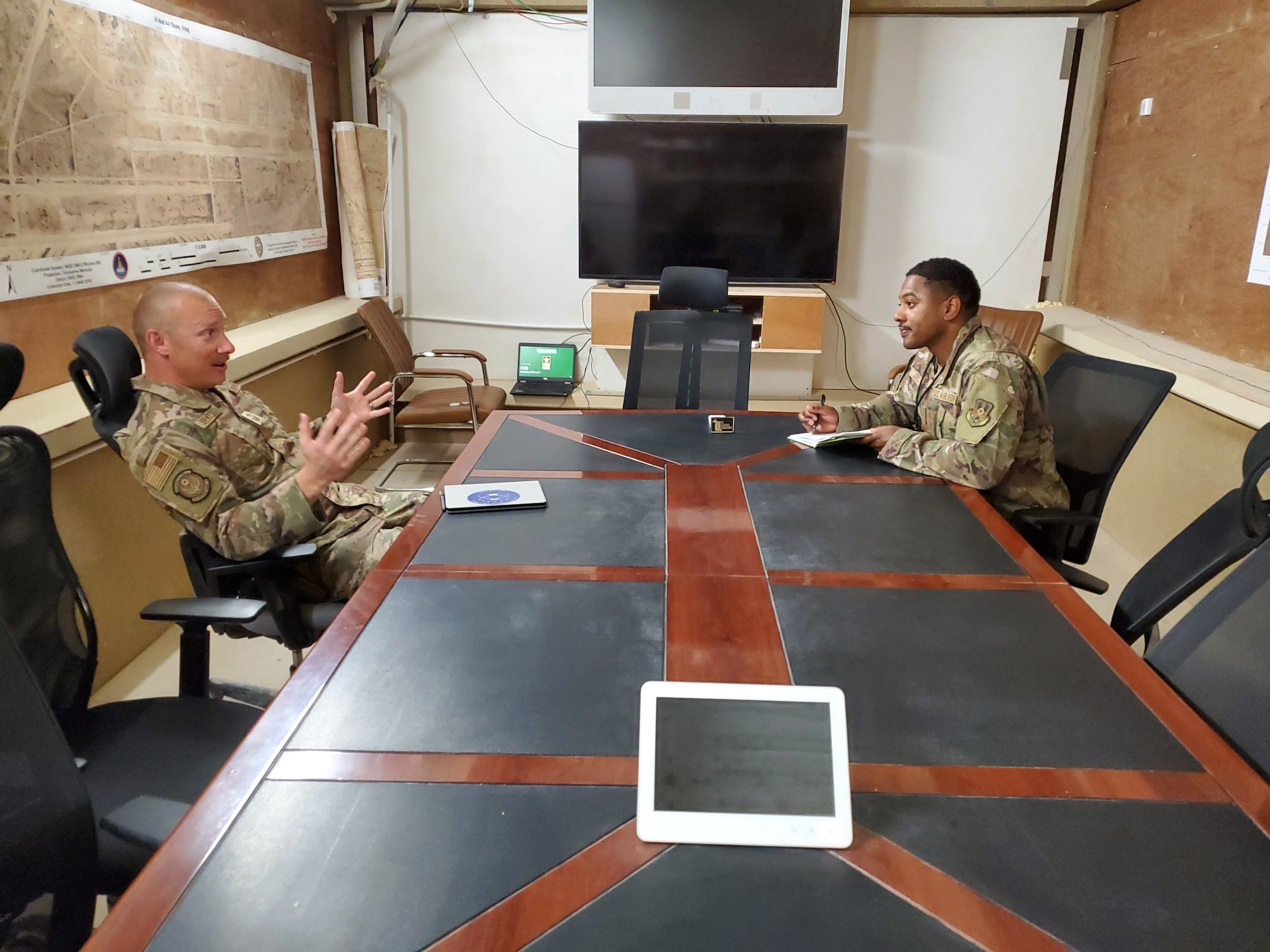 Senior Master Sgt. Benjamin Seekell discusses mentoring and career development with Tech. Sgt. Kenneth Jones recently from a deployed location in Iraq. CONTRIBUTED PHOTO
