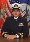 Studio portrait of Cmdr. Mark K. Poblete