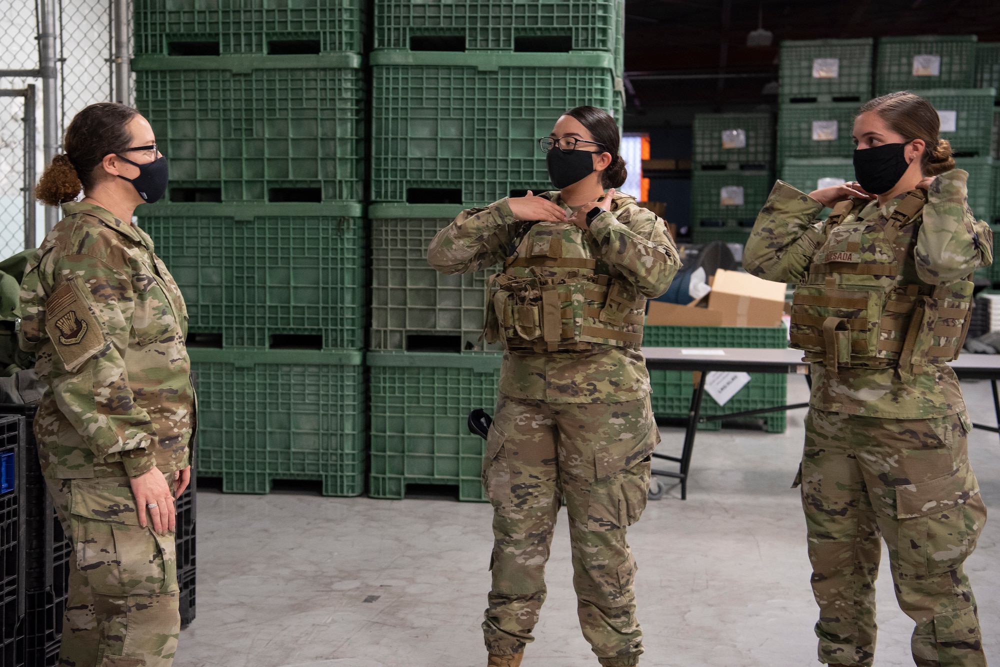 6th Air Refueling Wing command chief, Chief Master Sgt. Shae Gee (left), asks Airmen from the 6th Security Forces about their thoughts on their newly issued female Improved Outer Tactical Vest at MacDill Air Force Base, Fla., Feb. 17, 2021. These new vests are specifically designed for female Airmen to provide a better fit, weight distribution, increased range of movement and mobility thus increasing their abilities to perform and excel as defenders.