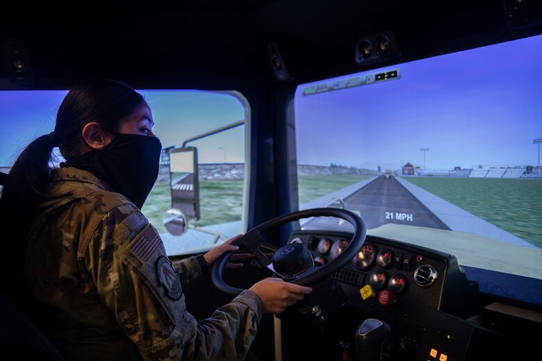 Woman drives a simulated truck