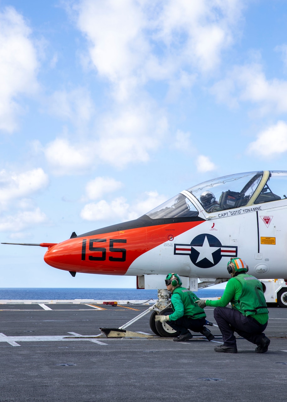 210205-N-UF271-1034 ATLANTIC OCEAN (Feb. 5, 2021) Italian Navy Ensign Erika Raballo, a student naval aviator assigned to the "Tigers" of Training Squadron 9, prepares to launch off USS Gerald R. Ford's (CVN 78) flight deck in a T-45C Goshawk jet trainer aircraft Feb. 5, 2021. Carrier qualification is one of the final elements of the undergraduate strike pilot training curriculum under Chief of Naval Air Training. Ford is underway in the Atlantic Ocean conducting carrier qualifications. (U.S. Navy photo by Mass Communication Specialist Seaman Anton Wendler)