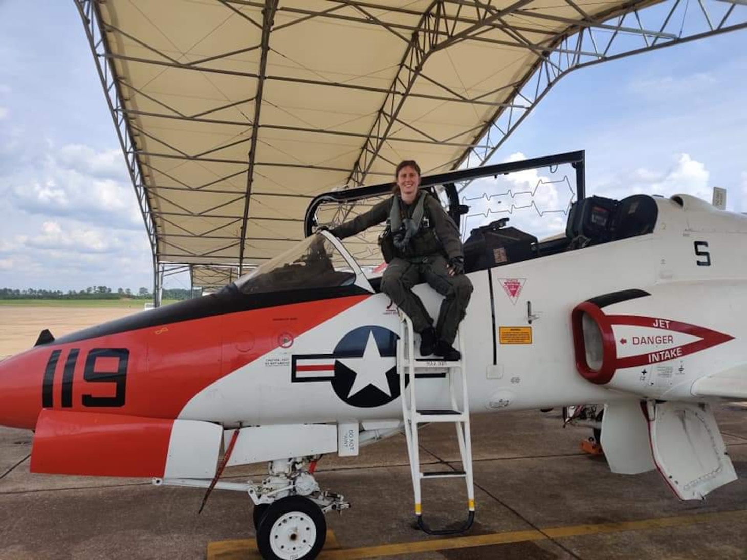 MERIDIAN, Miss. (June 2, 2020) Italian navy Ensign Erika Raballo, a student naval aviator, sits on a T-45C Goshawk jet trainer aircraft after completing her a training flight with the "Tigers" of Training Squadron (VT) 9 at Naval Air Station Meridian, June 2, 2020.