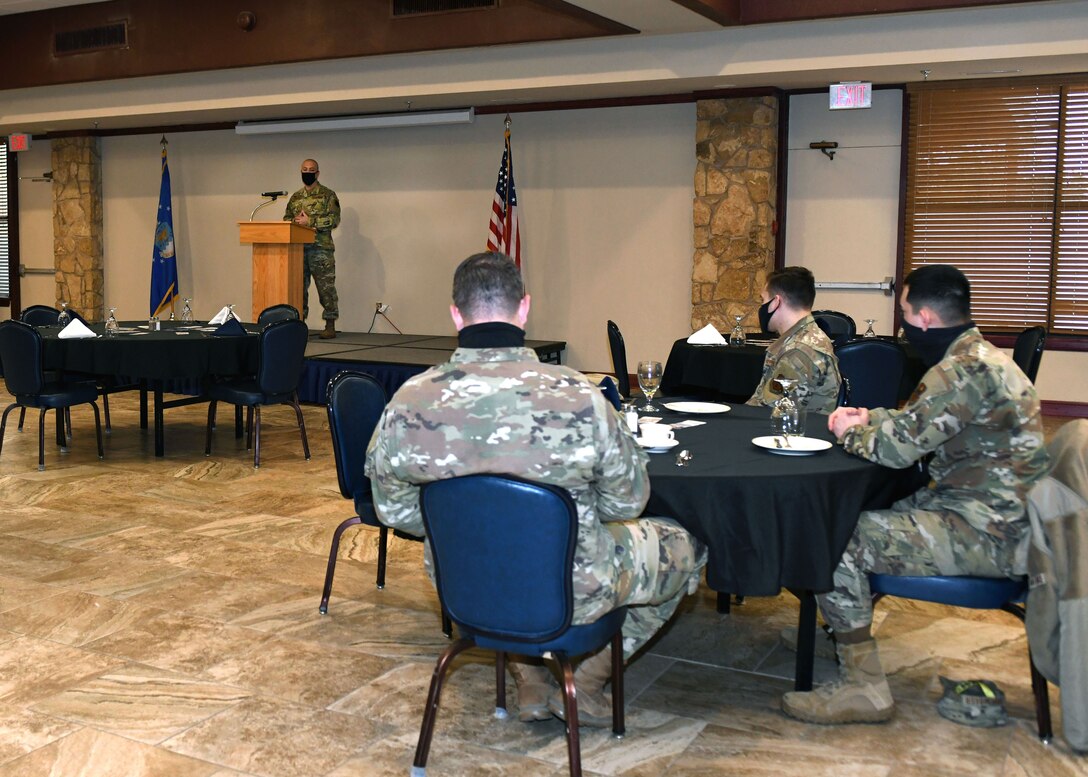 Master Sgt. T Shane Campbell, 97th Logistics Readiness Squadron first sergeant, speaks during the kick-off breakfast for the 2021 Altus Air Force Base (AFB) Annual Air Force Assistance Fund (AFAF) Campaign at Club Altus at Altus AFB, Oklahoma, March 8, 2021. This year, Altus AFB’s goal is to raise $18,063 to donate to the AFAF. (U.S. Air Force photo by Airman 1st Class Amanda Lovelace)