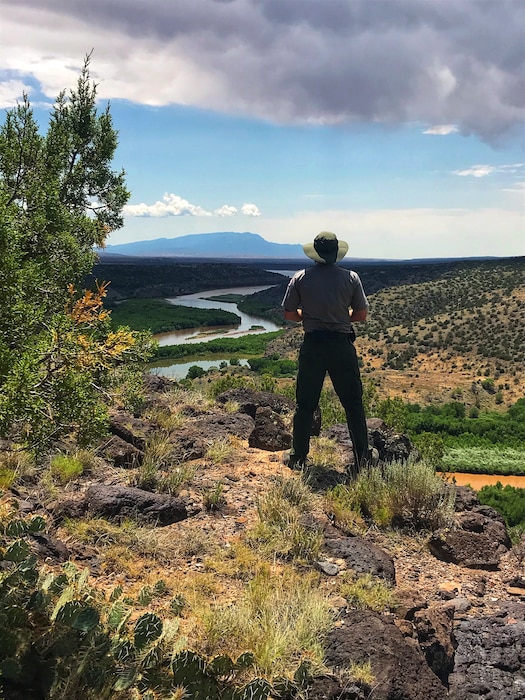 A park ranger overlooks the Rio Grande feeding into Cochiti Lake, Aug. 1, 2020, while performing backcountry patrol at the lake. Photo by Karyn Matthews. This photo placed third, based on employee voting.  This photo also received the Commander's Choice Award.