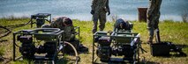 Water support technician Marines with Special Purpose Marine Air-Ground Task Force - Southern Command set up a lightweight water purification system during a command post exercise at Camp Lejeune, North Carolina, April 10, 2020. Water support technician Marines used lightweight water purification systems to purify water before providing it to the combat engineer Marines working at another site. The CPX increases readiness and challenges SPMAGTF-SC command and control, communications and timely decision-making capabilities through simulated real-world scenarios. SPMAGTF-SC will be deployed into the Southern Command area of operation to provide crisis response preparedness efforts, security cooperation training and engineering events to help strengthen relations with partner nations throughout Central and South America. (U.S. Marine Corps photo by Sgt. Andy O. Martinez)