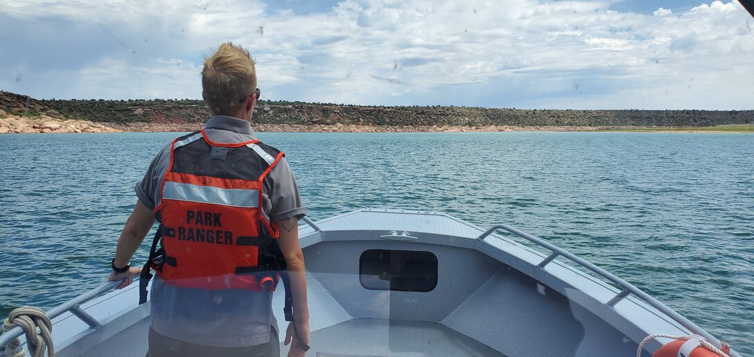 CONCHAS LAKE, N.M. – Cochiti Park Ranger Karyn Matthews on boat patrol at Conchas Lake, Aug. 15, 2020. Because Cochiti Lake was closed during the summer of 2020, some of the park rangers assigned there assisted at other district lakes.