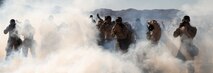 U.S. Marines with Bravo Company, 3rd Light Armored Reconnaissance Battalion, 1st Marine Division, utilize M50 gas masks during a chemical, biological, radiological and nuclear defense training exercise at Marine Corps Air Ground Combat Center, Twentynine Palms, California, Nov. 19, 2020. The assigned exercise was to test long range movement in vehicles, increase confidence in their gear, and rehearse CBRN response products. (U.S. Marine Corps photo by Lance Cpl. Therese Edwards)