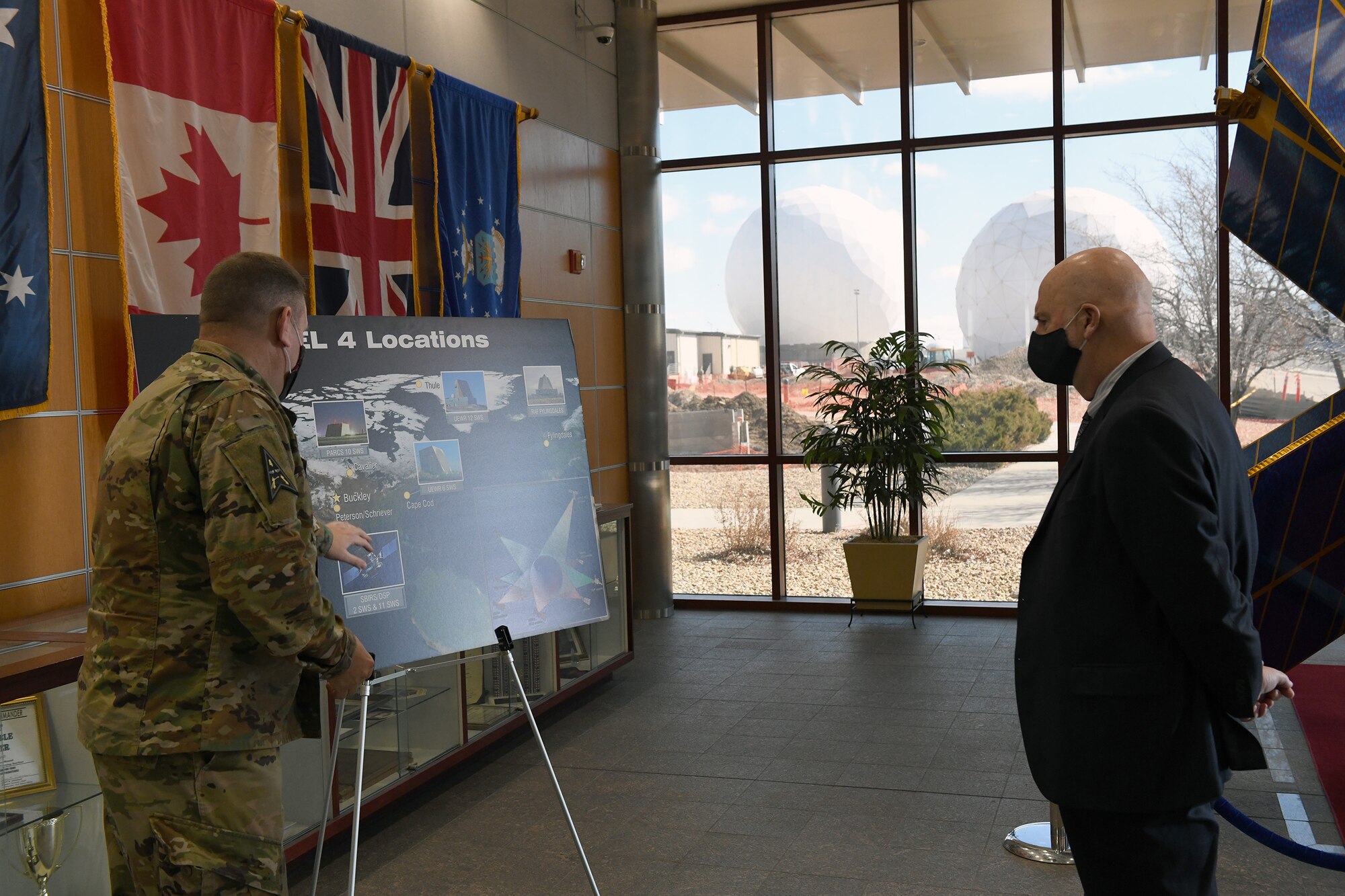 U.S. Space Force Col. Richard Bourquin, Space Delta 4 commander, briefs the Honorable John P. Roth, Acting Secretary of the Air Force at the Mission Control Station on Buckley Air Force Base, Colo., March 11, 2021. Bourquin explained the critical, no-fail missile warning mission of DEL 4. (U.S. Space Force photo by Airman 1st Class Haley N. Blevins)