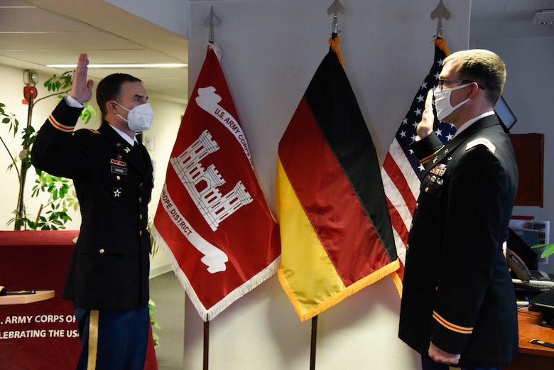 U.S. Army Corps of Engineers, Europe District Commander Col. Patrick J. Dagon reissues the oath of office to recently promoted Lt. Col. Daniel J. Fox as part of his promotion ceremony in Wiesbaden, Germany Feb. 26, 2021. (U.S. Army photo by Alfredo Barraza)