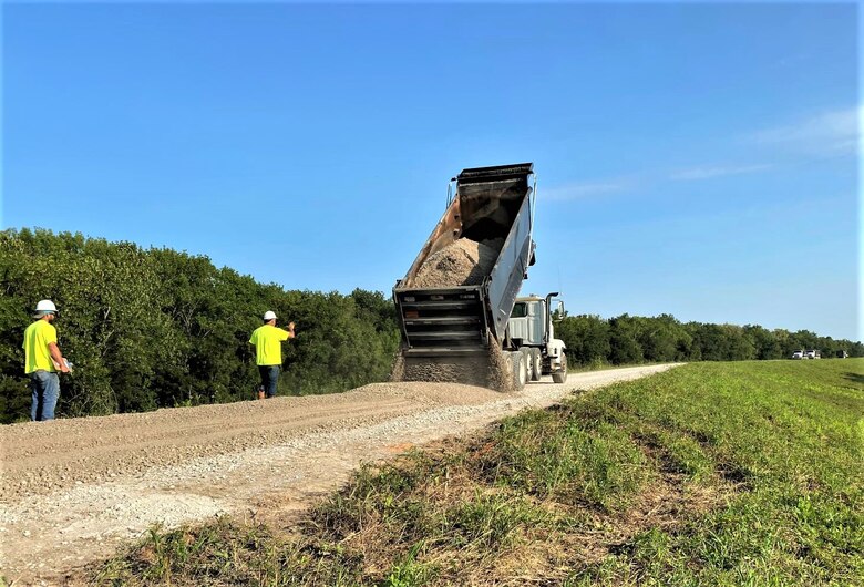 IN THE PHOTO, A Rock Construction works to resurface the levee crown near Phillips County, Arkansas. 2019 flood damage supplemental funds funded the project.