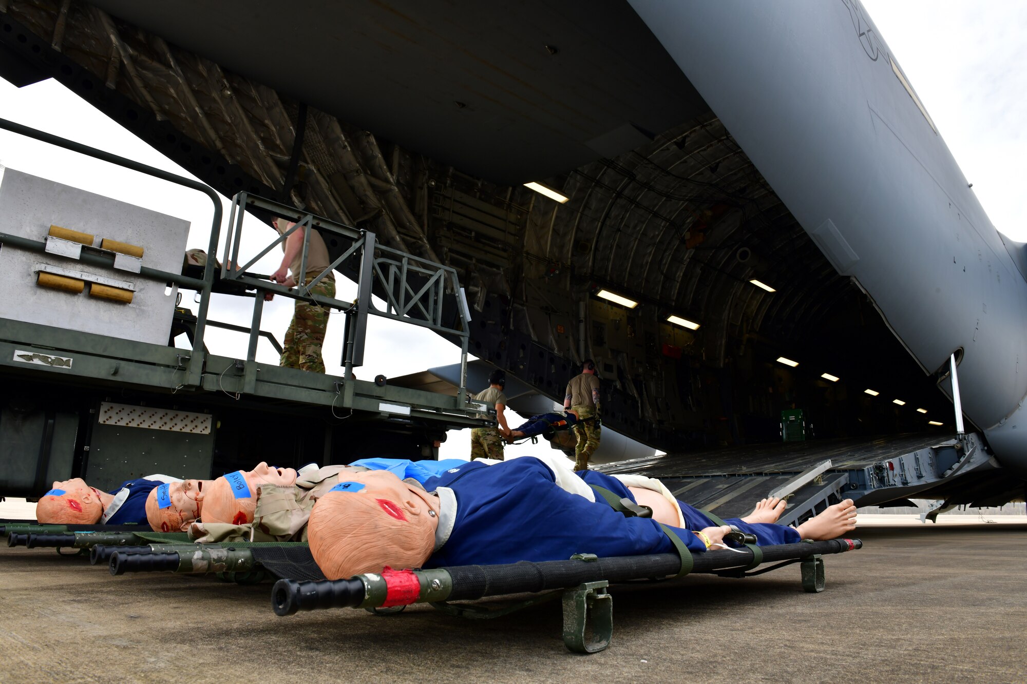 Airmen prepare to transload simulated patients