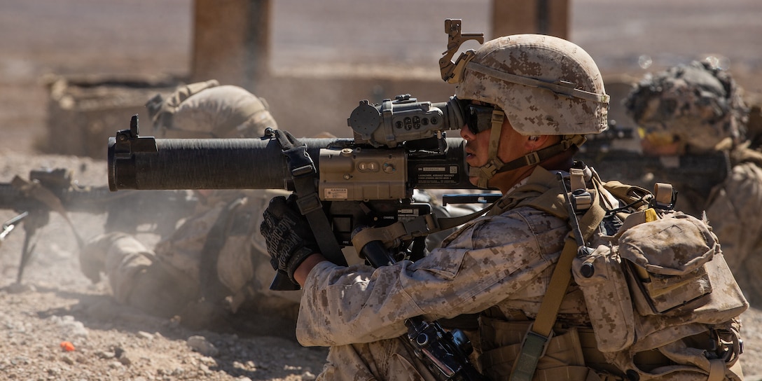 U.S. Marine Corps Lance Cpl. Keaone R. Stephens, assaultman, Company E, 2nd Battalion, 7th Marines Regiment, 1st Marine Division, uses a MK 153 Shoulder-Launched Multipurpose Assault Weapon Mod 2‘s laser range finder during Integrated Training Exercise 2-21 at Marine Corps Air Ground Combat Center, Twentynine Palms, California, March 5, 2021. Range 400 provides platoon and company sized elements with live-fire training attacking an enemy strongpoint. (U.S. Marine Corps photo by Lance Cpl. Gustavo Romero)