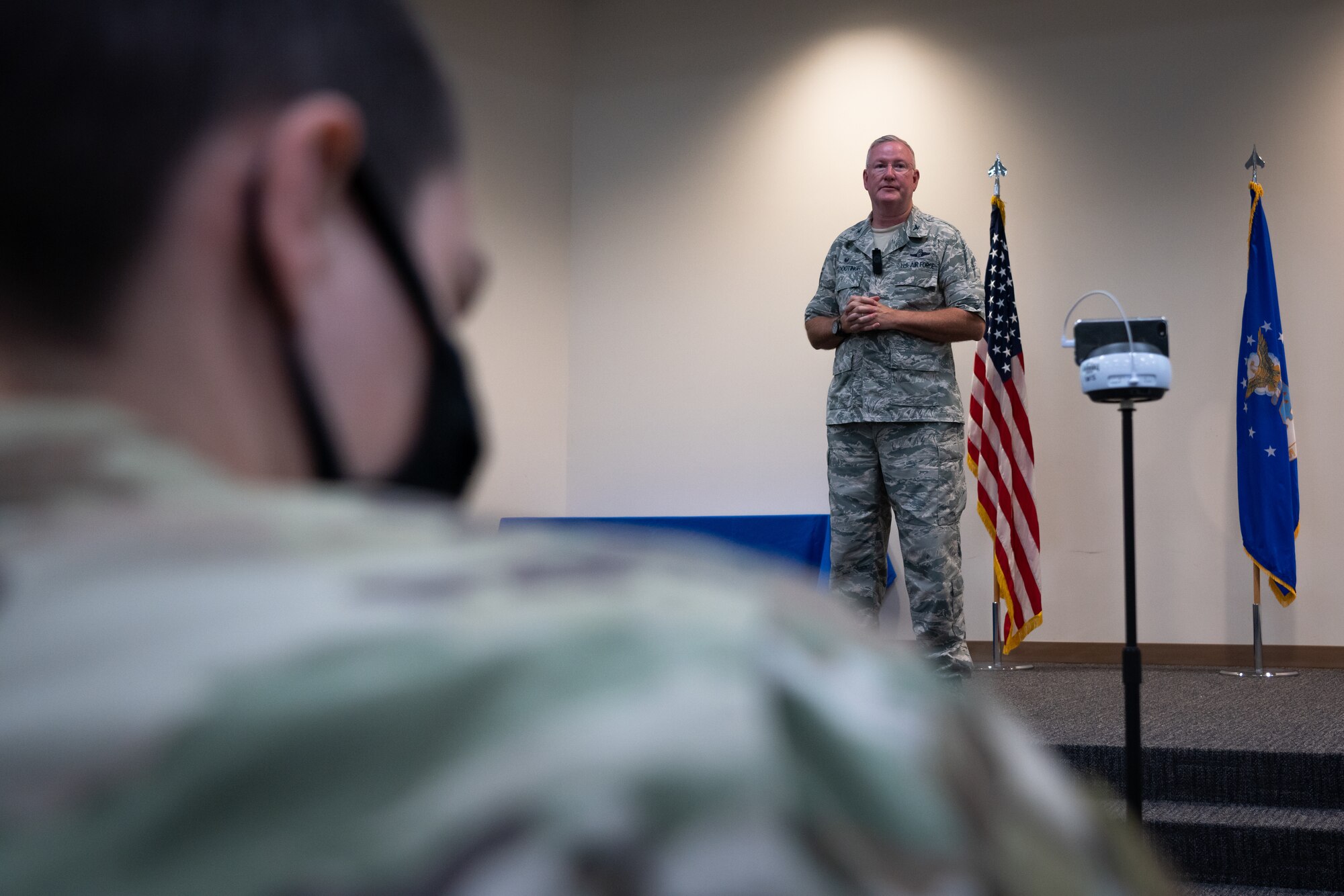 Col. Jeffrey A. Van Dootingh, commander of the 403rd wing, recognizes members during a commander’s call at Keesler Air Force Base, Mississippi, March 13, 202. Col. Van Dootingh also spoke about topics such as  COVID-19, dress and appearance changes, and other important topics. (U.S. Air Force photo by Staff Sgt. Shelton Sherrill)