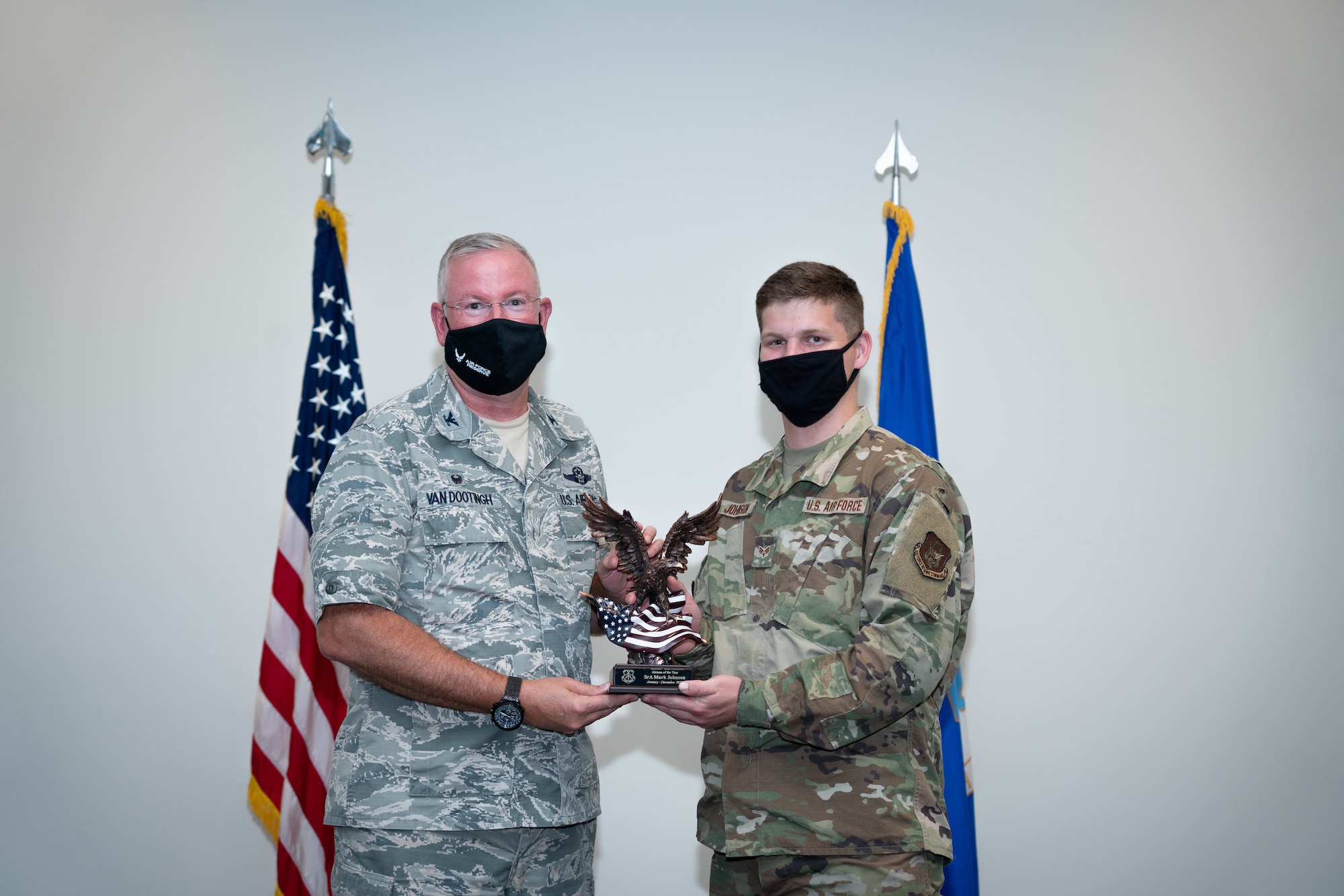 Senior Airman Mark Johnson with the 403rd Wing receives the Airman of the Year Award during a commander’s call at Keesler Air Force Base, Biloxi Mississippi, March 13, 2021 . Top performers from the wing were recognized for their outstanding work throughout fourth quarter of 2020. (U.S. Air Force photo by Staff Sgt. Shelton Sherrill)