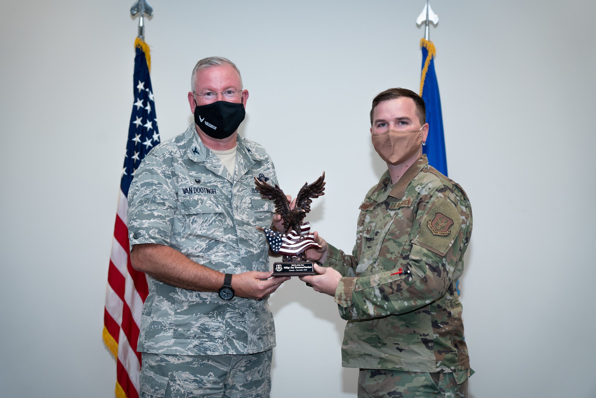 Master Sgt. Jay Hommerbocker with the 403rd Wing receives the Senior Noncommissioned Officer of the Year award  Award during a commander’s call at Keesler Air Force Base, Biloxi Mississippi, March 13, 2021 . Top performers from the wing were recognized for their outstanding work throughout fourth quarter of 2020. (U.S. Air Force photo by Staff Sgt. Shelton Sherrill)