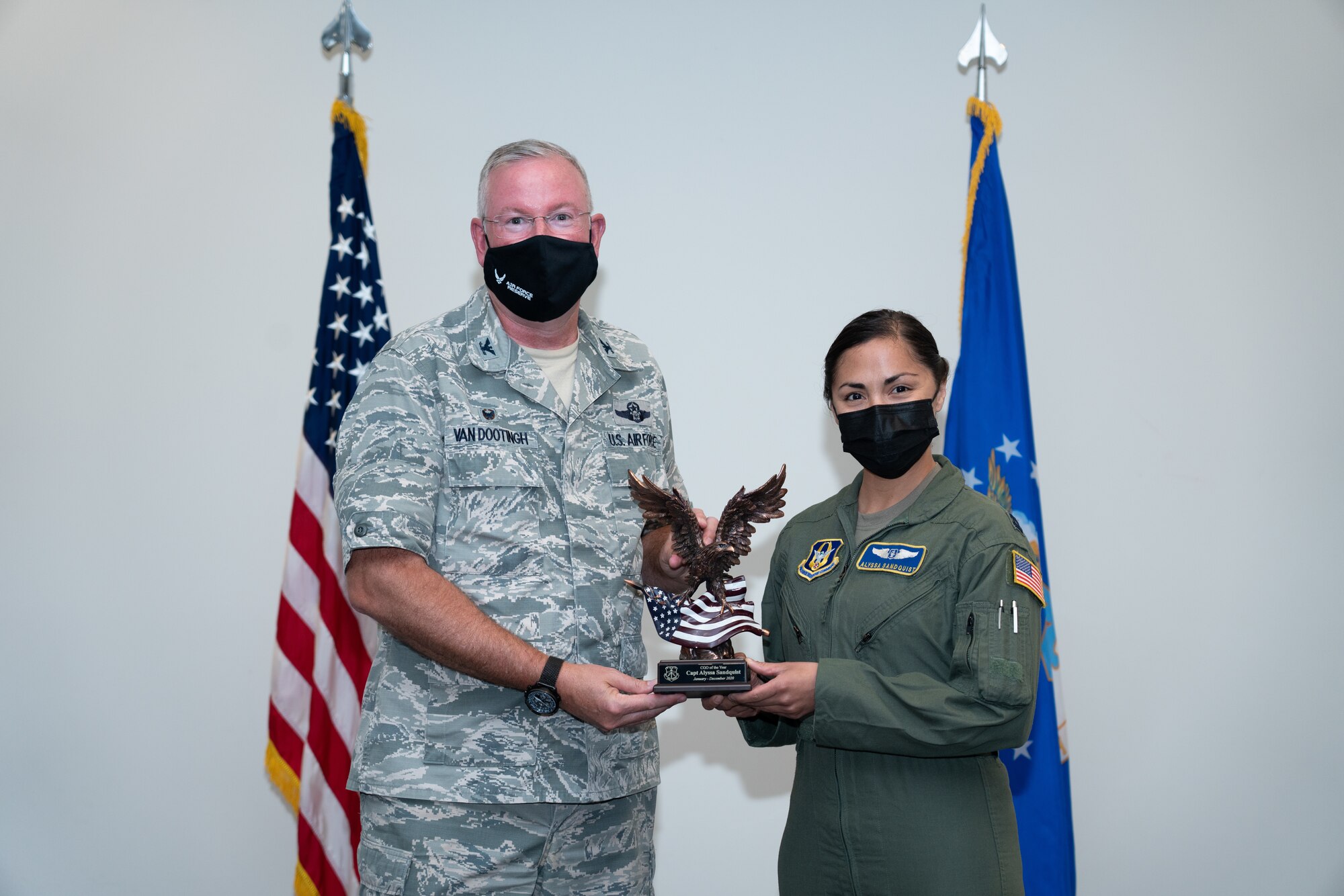 Capt. Alyssa Sandquist with the 403rd Wing receives the Company Grade Officer of the Year Award during a commander’s call at Keesler Air Force Base, Biloxi Mississippi, March 13, 2021 . Top performers from the wing were recognized for their outstanding work throughout fourth quarter of 2020. (U.S. Air Force photo by Staff Sgt. Shelton Sherrill)
