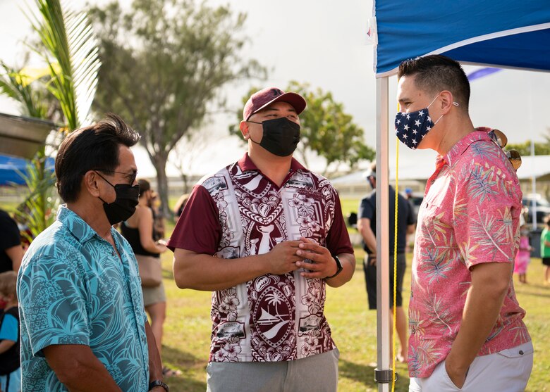 U.S. Air Force Col. David Aragon, vice commander of the 36th Wing, speaks with Rudy Paco, mayor of Mongmong-Toto-Maite, and Kevin Susuico, mayor of Agat, during the Tåotåo Guåhan event at Arc Light Memorial Park at Andersen Air Force Base, Guam, March 13, 2021. In honor of CHamoru Month, the Andersen AFB community hosted an event to celebrate the island’s indigenous culture and heritage with members of the base and local residents in attendance. (U.S. Air Force photo by Senior Airman Aubree Owens)