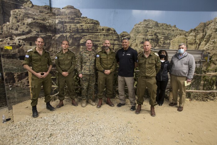 Israeli Defense Forces leaders pose for a group photo with staff from the Simulator Integration Center and Range Control Operations Complex and Infantry Immersion Trainer during a tour from II Marine Expeditionary Force personnel which showcased various simulation and training facilities on Camp Lejeune, N.C., Mar. 10, 2021.