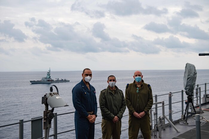 Capt. Joe Bagget, USS Monterey commanding officer, left, and Israel Defense Force naval leadership pose for a photo aboard the Ticonderoga-class guided missile cruiser USS Monterey in the Eastern Mediterranean Sea, March 15, 2021. Monterey is operating with the IKE Carrier Strike Group on a routine deployment in the U.S. Sixth Fleet area of operations in support of U.S. national interests and security in Europe and Africa. (U.S. Navy photo by Mass Communication Specialist Seaman Chelsea Palmer/Released)