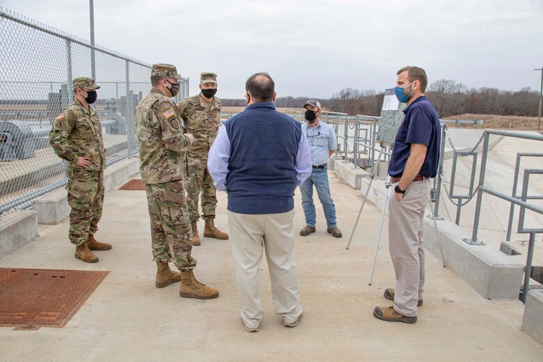 IN THE PHOTO, Memphis District Commander Col. Zachary Miller and other district leaders hosted the Senior Official Performing the Duties of the Assistant Secretary of Army (Civil Works), Mr. Vance Stewart, and USACE's Deputy Commanding General for Civil and Emergency Operations, Maj. Gen. William (Butch) H. Graham, on March 11, 2021. During his tour, Graham stopped by the Grand Prairie Project to learn more about conserving groundwater resources throughout the region and is briefed by subject matter experts on the project and what is needed to complete the project, preserve groundwater, and save life, land and agriculture for many more years to come. (USACE Photo by Vance Harris)