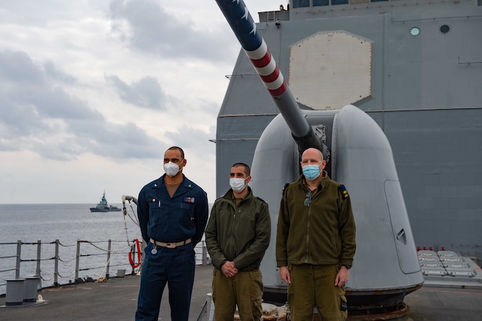 Capt. Joe Bagget, USS Monterey commanding officer, left, and Israel Defense Force naval leadership pose for a photo aboard the Ticonderoga-class guided missile cruiser USS Monterey in the Eastern Mediterranean Sea, March 15, 2021. Monterey is operating with the IKE Carrier Strike Group on a routine deployment in the U.S. Sixth Fleet area of operations in support of U.S. national interests and security in Europe and Africa. (U.S. Navy photo by Mass Communication Specialist Seaman Chelsea Palmer/Released)